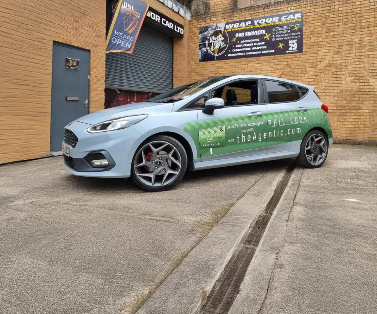 Wide front shot of Ford Fiesta wrapped for estate agent marketing in Worcestershire.