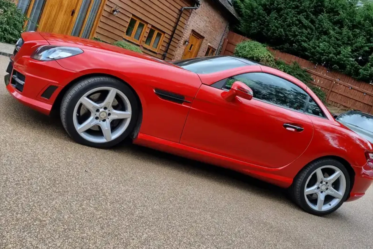 Side profile of Mercedes colour change wrap finished in gloss red at Wrap Your Car Kidderminster