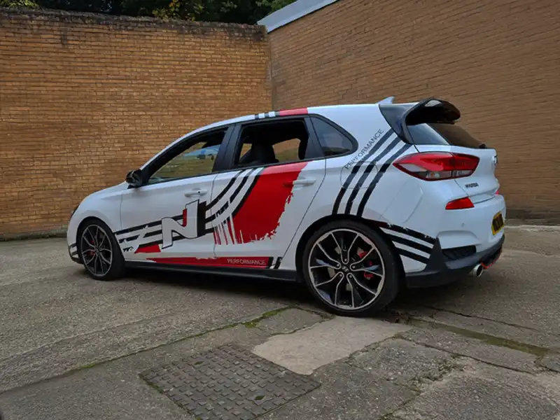 Custom car graphics and vinyl decals applied to vehicle at our Kidderminster workshop