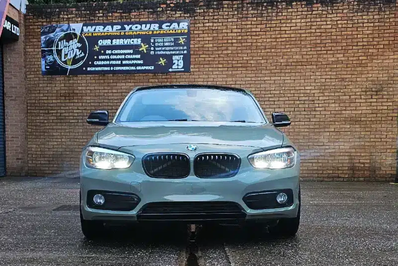 Front view of BMW 1 Series in khaki green full colour change vinyl wrap